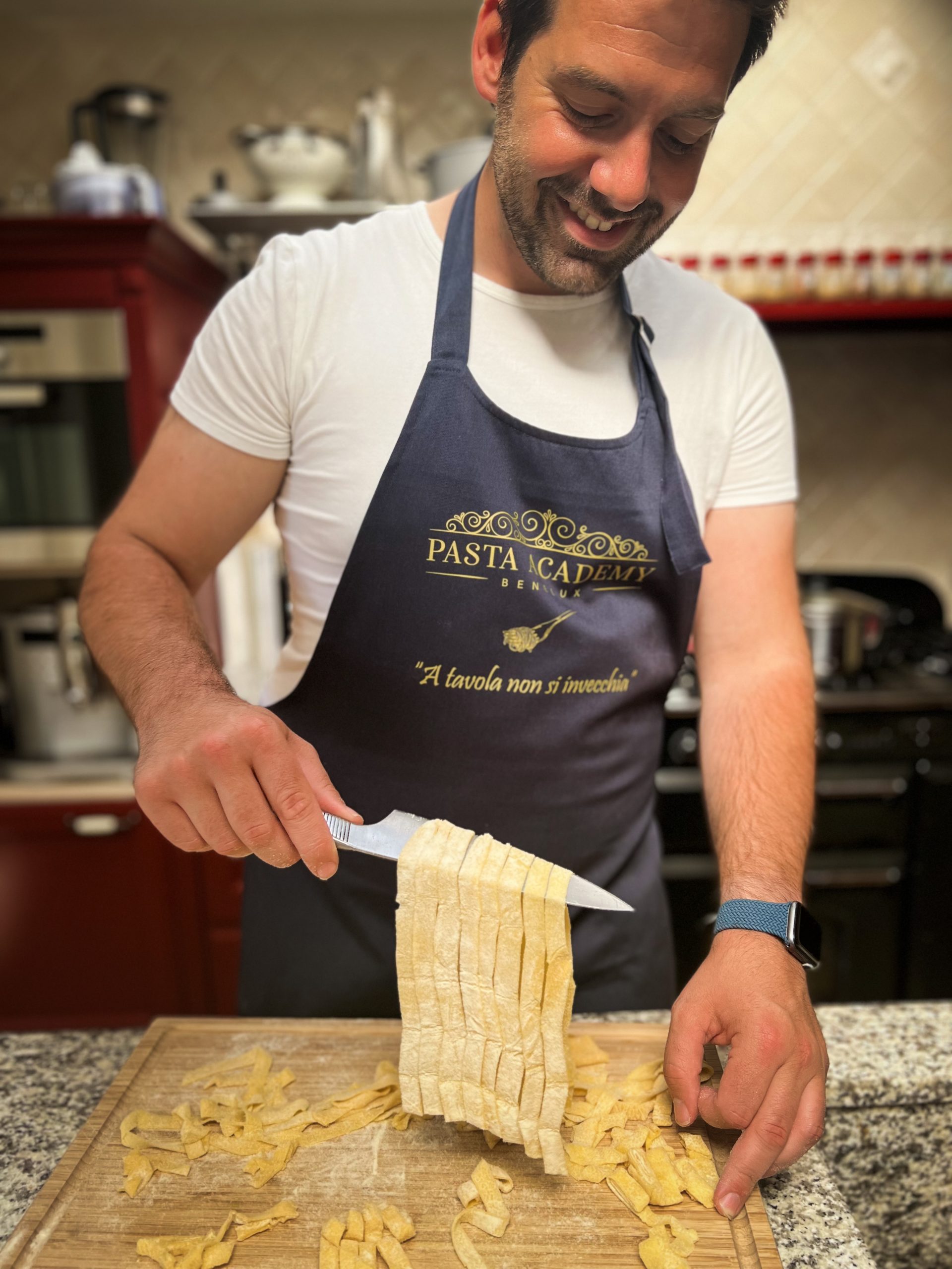 Luxe Italiaanse keukenschort "A tavola non si invecchia"